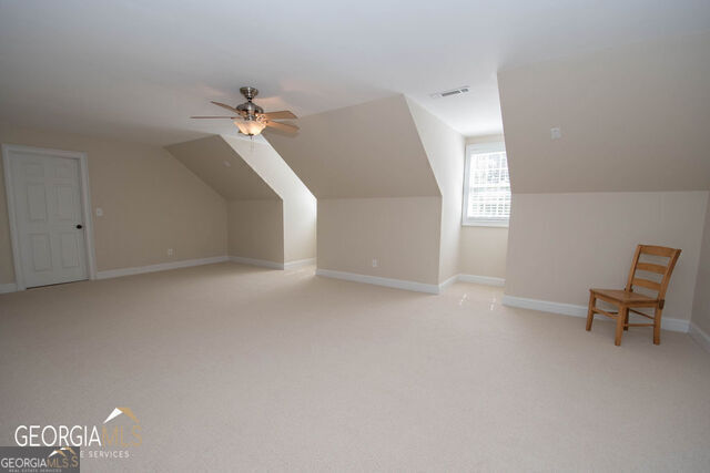 531 Grant Road Brooks, GA 30205 - Photo 47 of 96 an empty room with windows and ceiling fan