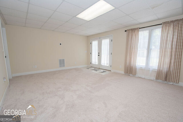 531 Grant Road Brooks, GA 30205 - Photo 52 of 96 a view of an empty room with a window