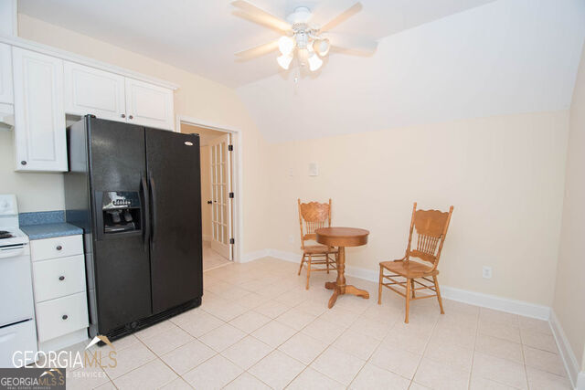 531 Grant Road Brooks, GA 30205 - Photo 53 of 96 a kitchen with stainless steel appliances refrigerator cabinets and furniture