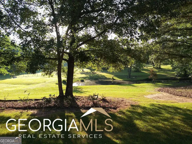 a stove top oven sitting inside of a kitchen