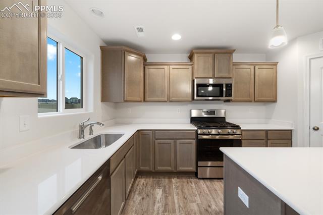 5067 Truscott Road Colorado Springs, CO 80925 - Photo 4 of 15 *Photos of previous inventory home of same floor plan*