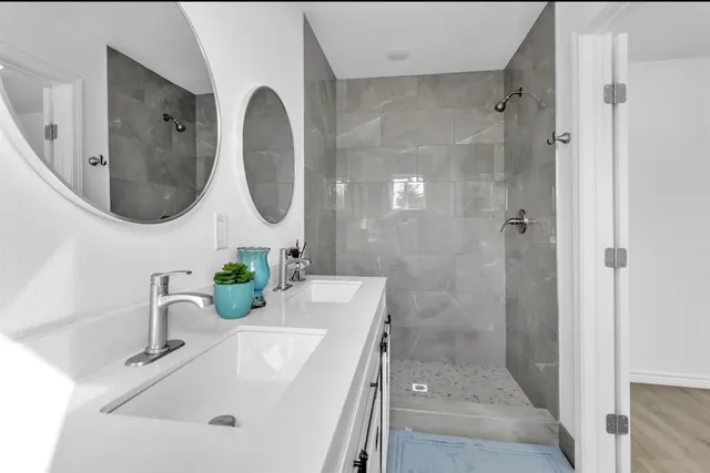 a bathroom with a sink and a mirror