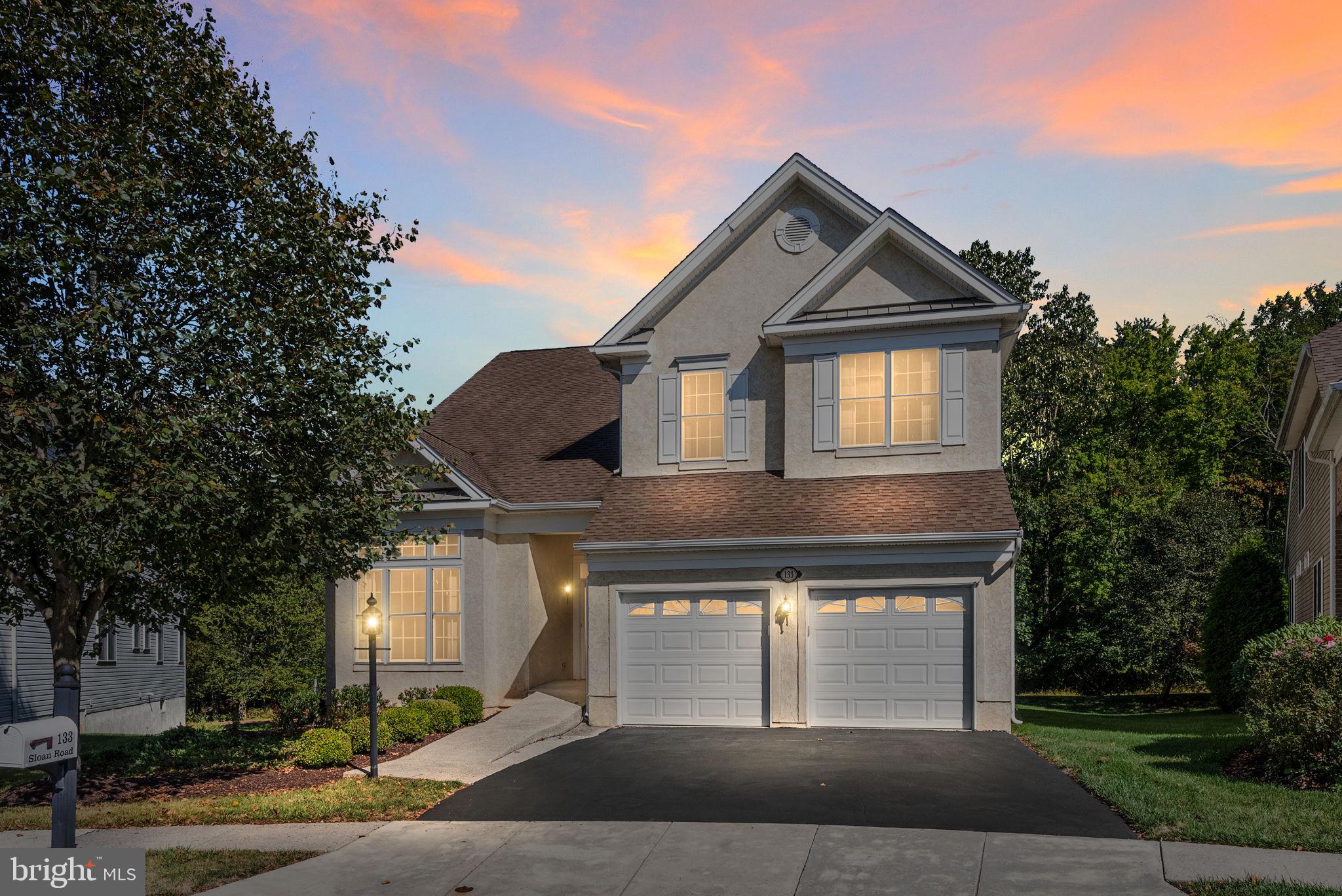 133 Sloan Road Phoenixville, PA 19460 - Photo 2 of 67 a front view of a house with a yard and garage