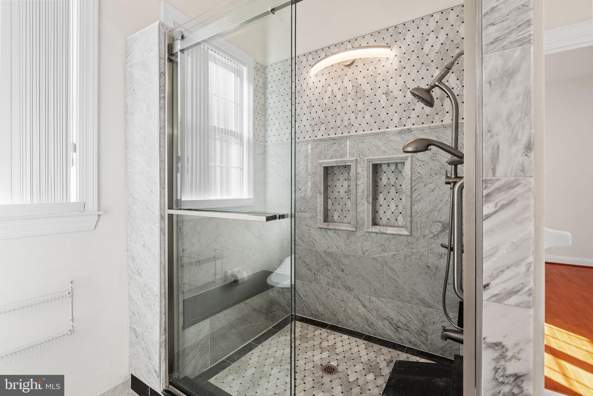 133 Sloan Road Phoenixville, PA 19460 - Photo 21 of 67 a bathroom with a glass shower door