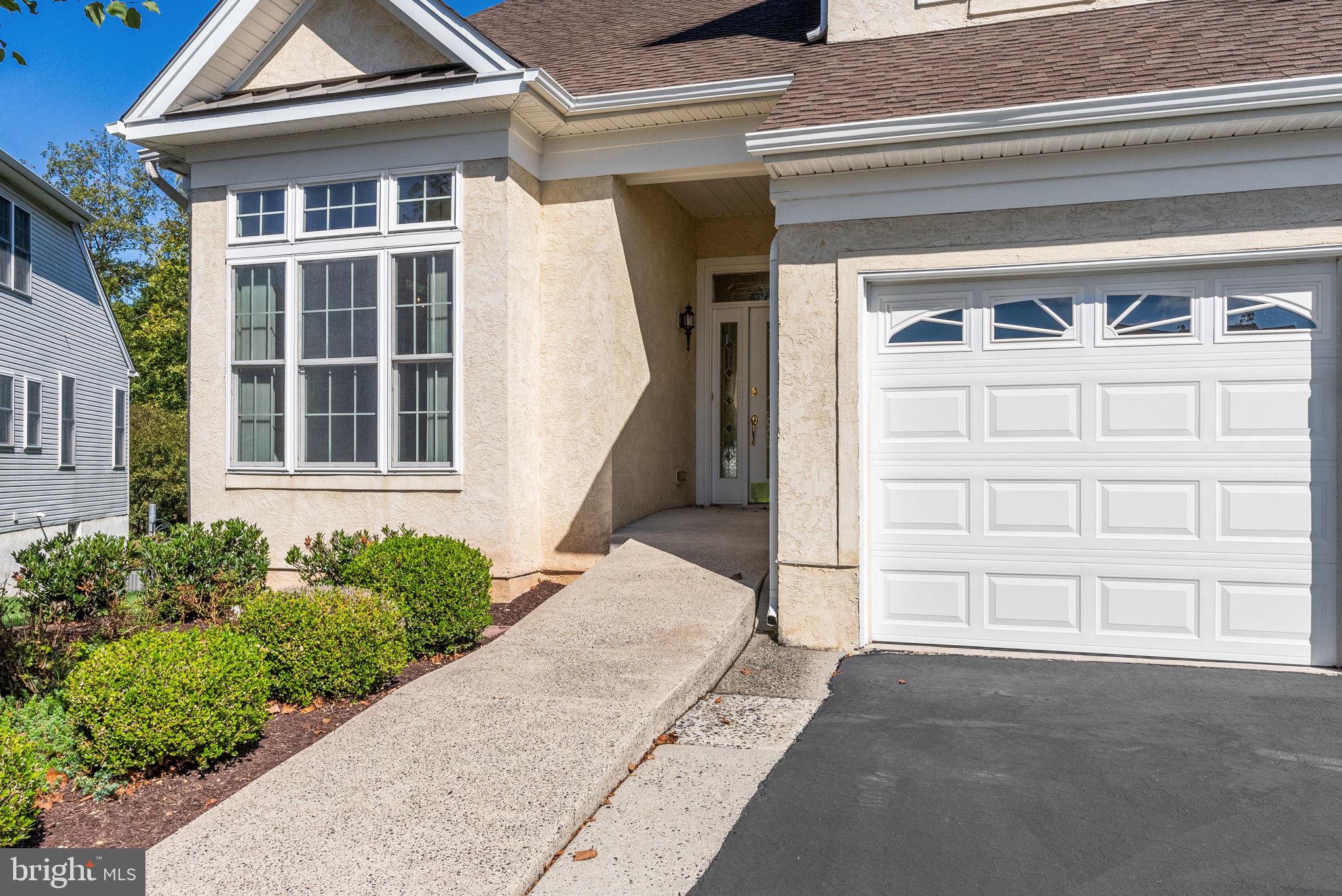133 Sloan Road Phoenixville, PA 19460 - Photo 3 of 67 a front view of a house with a yard