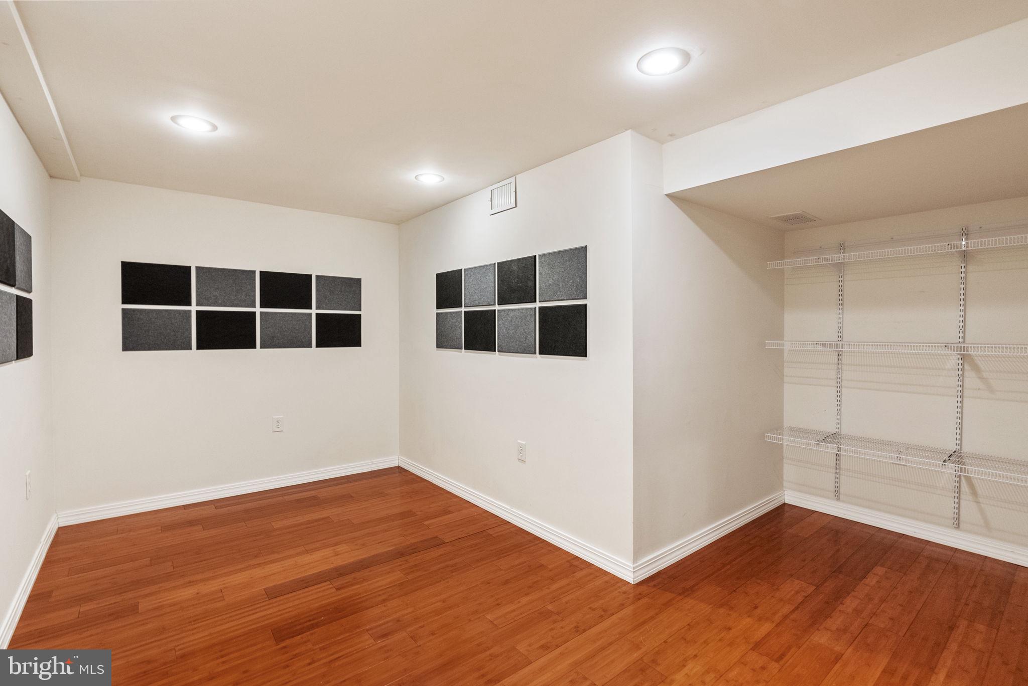 133 Sloan Road Phoenixville, PA 19460 - Photo 36 of 67 a view of an empty room with wooden floor