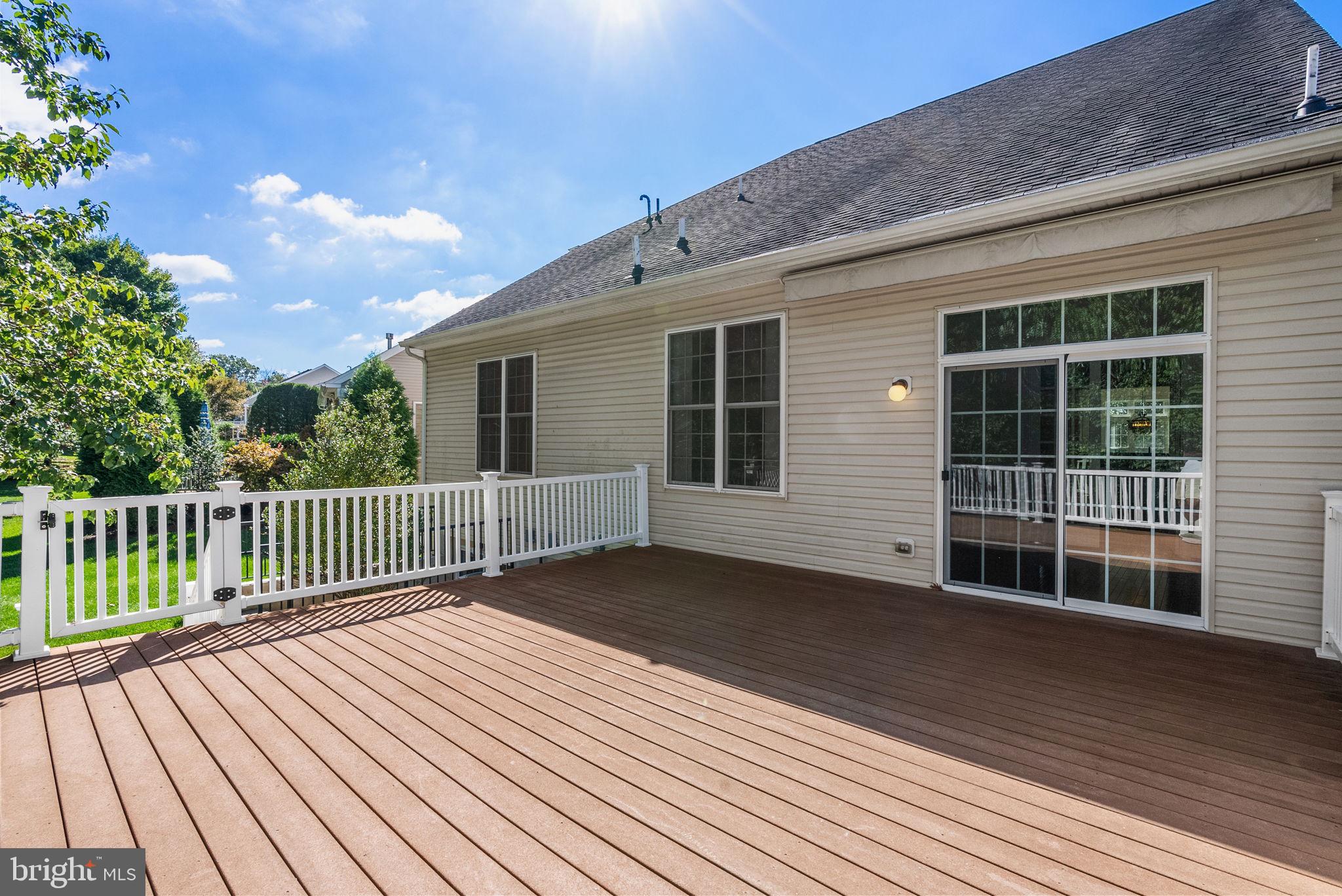 133 Sloan Road Phoenixville, PA 19460 - Photo 42 of 67 a view of a house with wooden deck