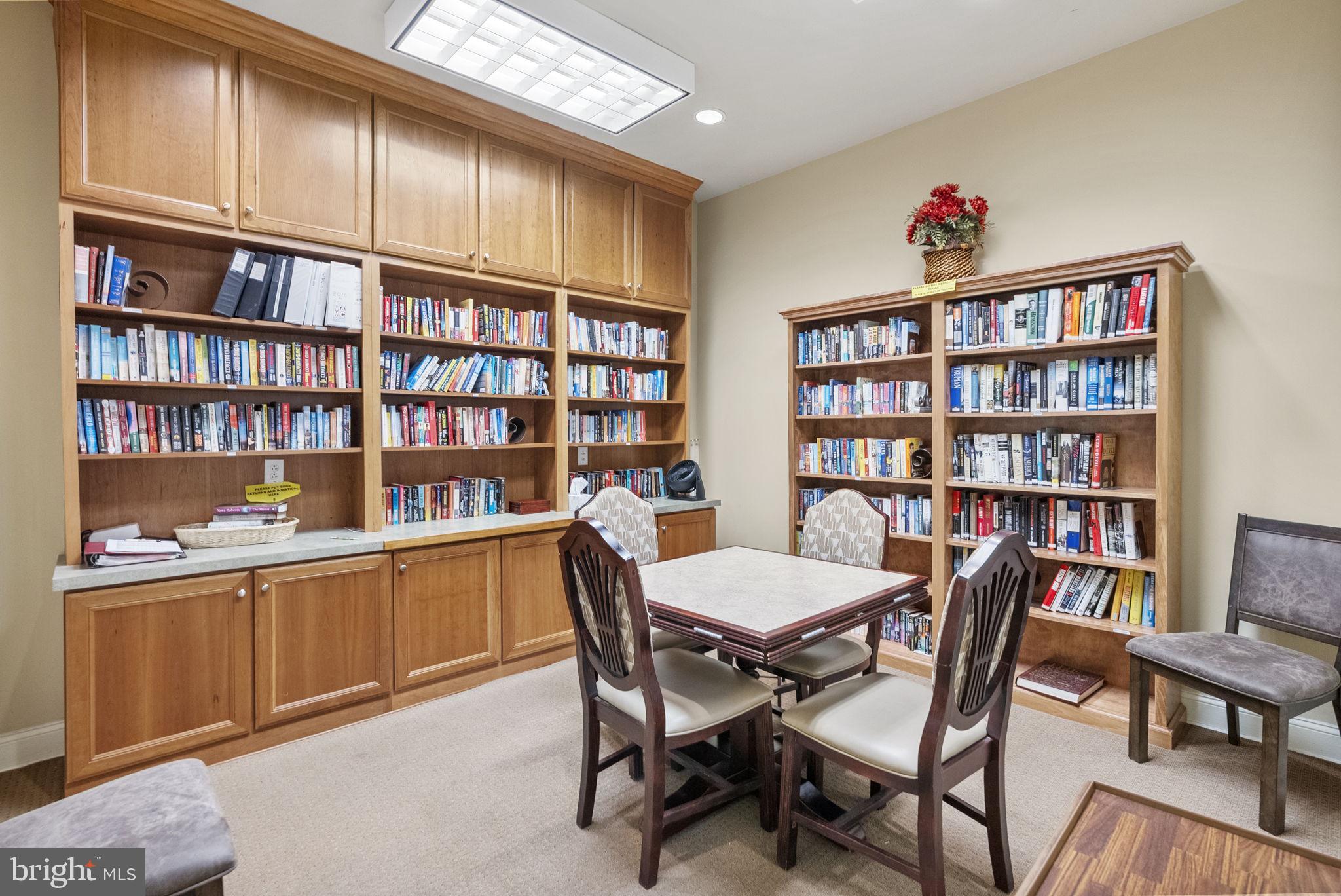 133 Sloan Road Phoenixville, PA 19460 - Photo 61 of 67 a view of a workspace with furniture and a bookshelf