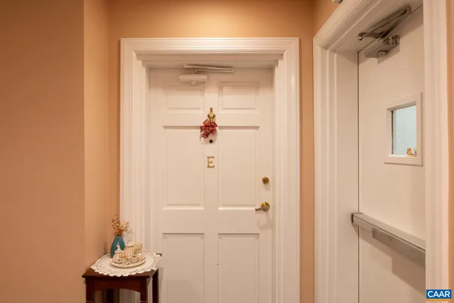 a view of a bathroom with a sink and mirror