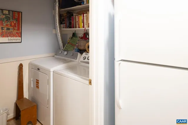 a utility room with a window dryer and washer