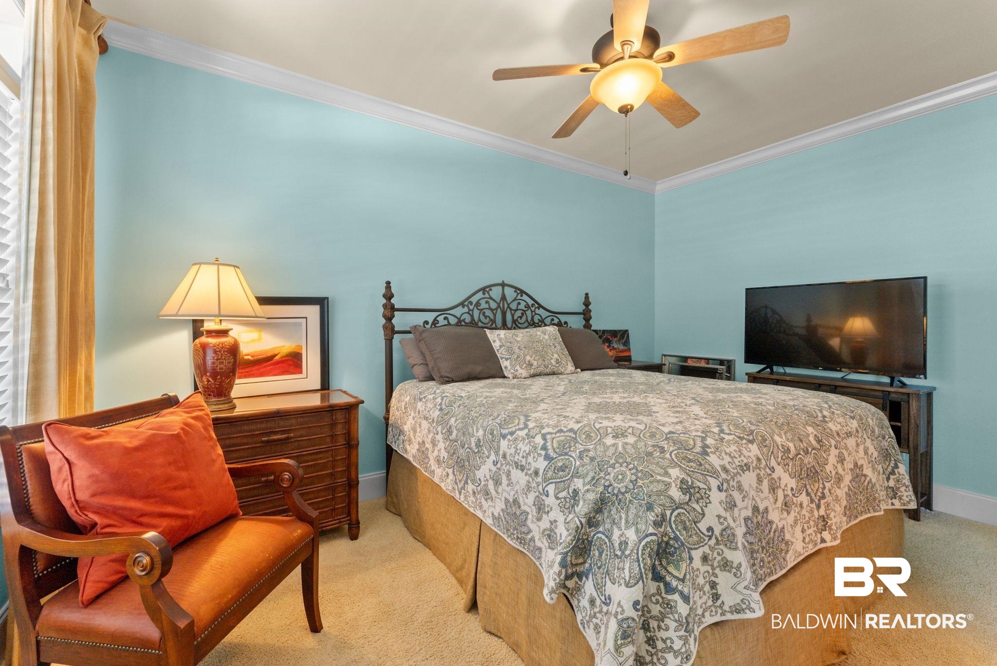 30818 River Road Orange Beach, AL 36561 - Photo 63 of 81 Bedroom featuring crown molding, carpet flooring, and a ceiling fan