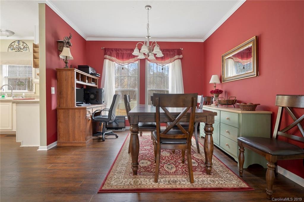 2804 Plyler Mill Road Lancaster, SC 29720 - Photo 14 of 32 a work room with furniture and wooden floor