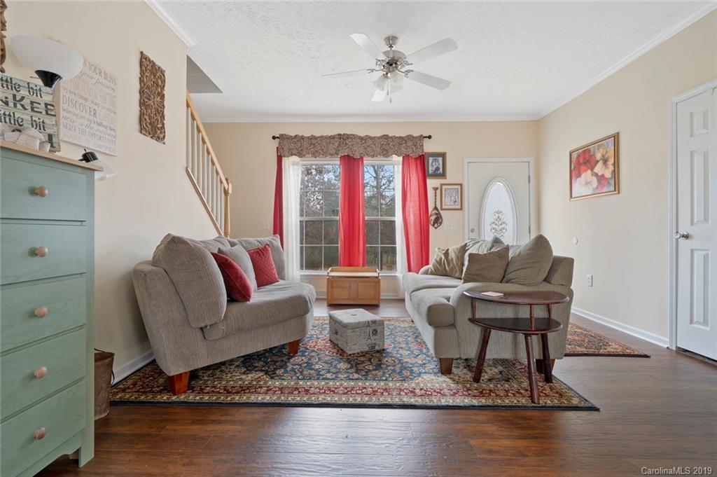 2804 Plyler Mill Road Lancaster, SC 29720 - Photo 15 of 32 a living room with furniture and a large window