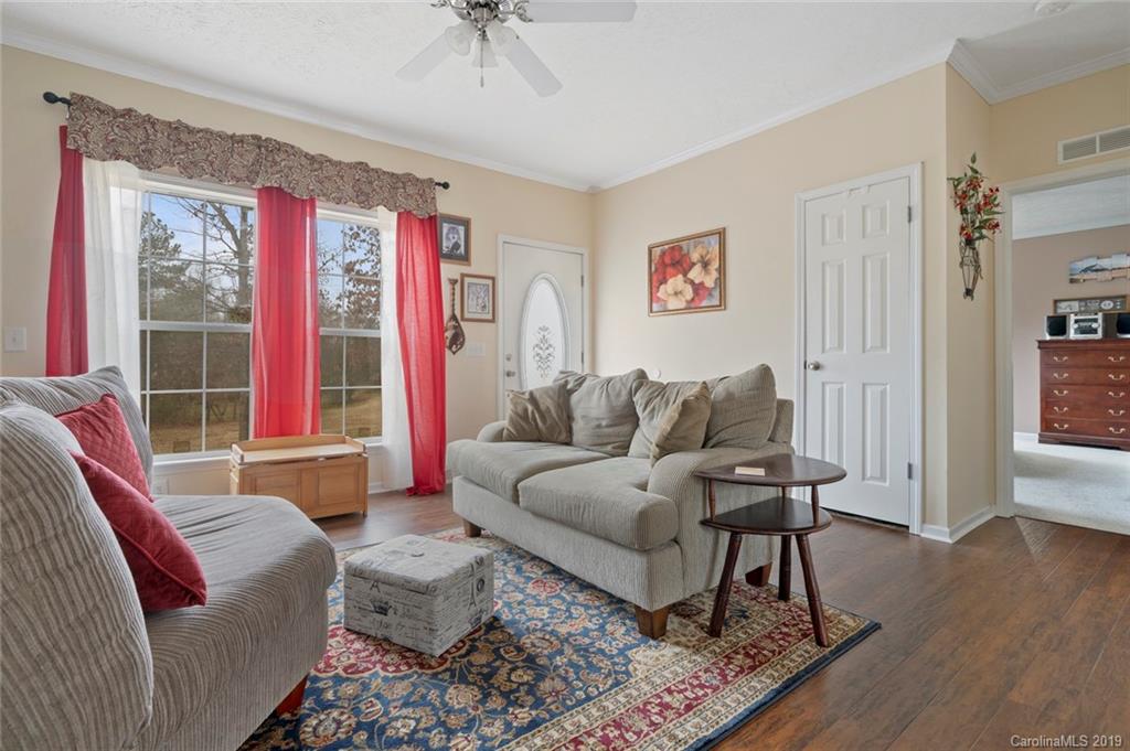 2804 Plyler Mill Road Lancaster, SC 29720 - Photo 16 of 32 a living room with furniture and a large window