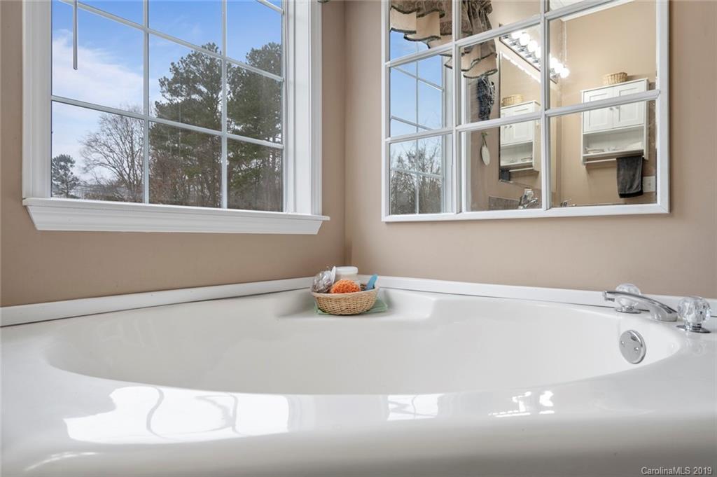 2804 Plyler Mill Road Lancaster, SC 29720 - Photo 22 of 32 a bath tub sitting next to a window