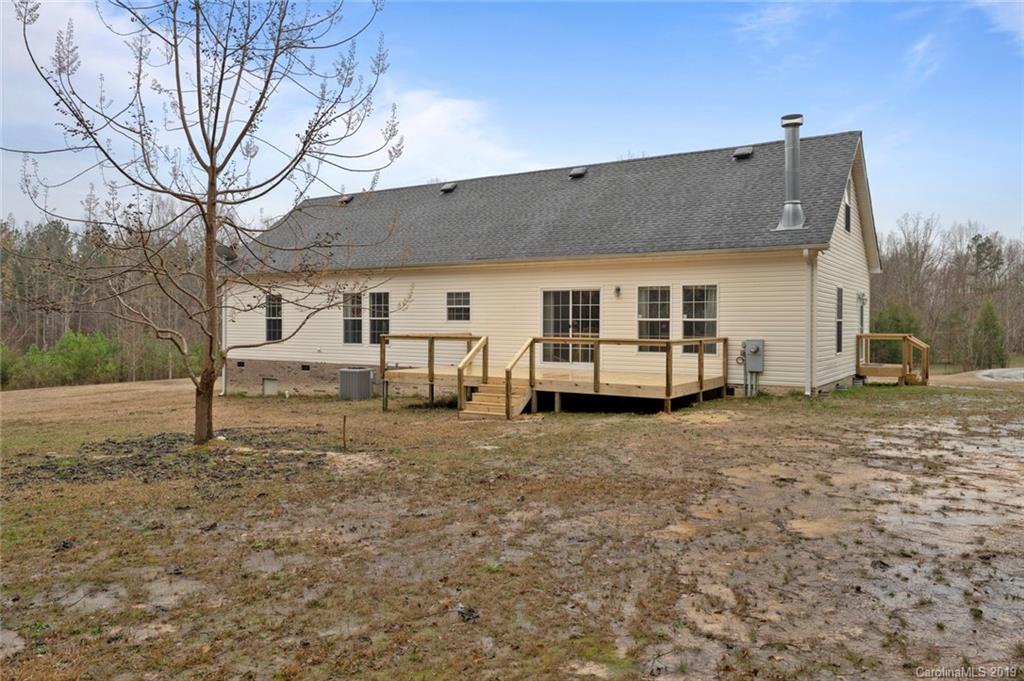 2804 Plyler Mill Road Lancaster, SC 29720 - Photo 29 of 32 a view of a house with backyard and trees