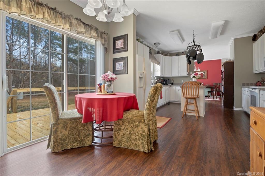 2804 Plyler Mill Road Lancaster, SC 29720 - Photo 6 of 32 a living room with furniture and wooden floor