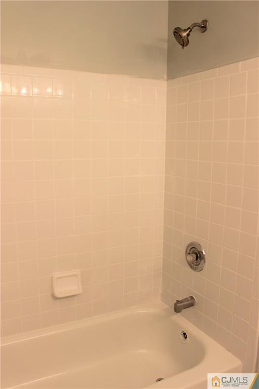 43 Alpine Road Holmdel, NJ 07733 - Photo 24 of 25 a bathroom with a bathtub