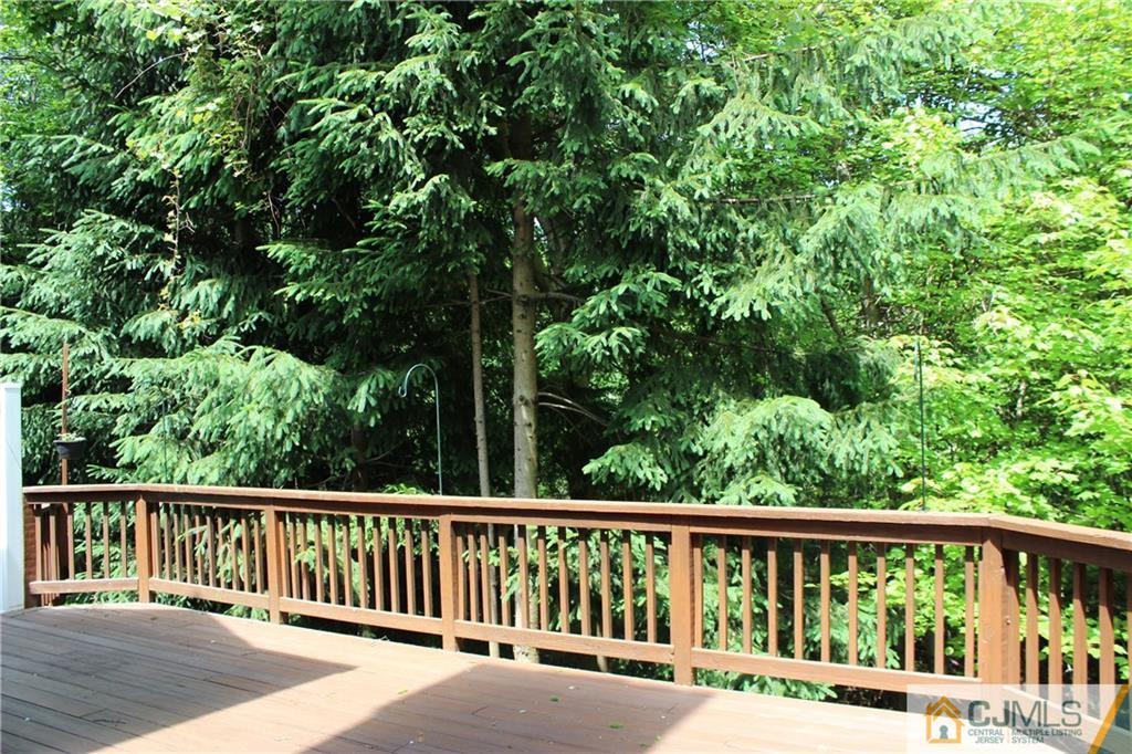 43 Alpine Road Holmdel, NJ 07733 - Photo 25 of 25 a view of balcony with deck and yard