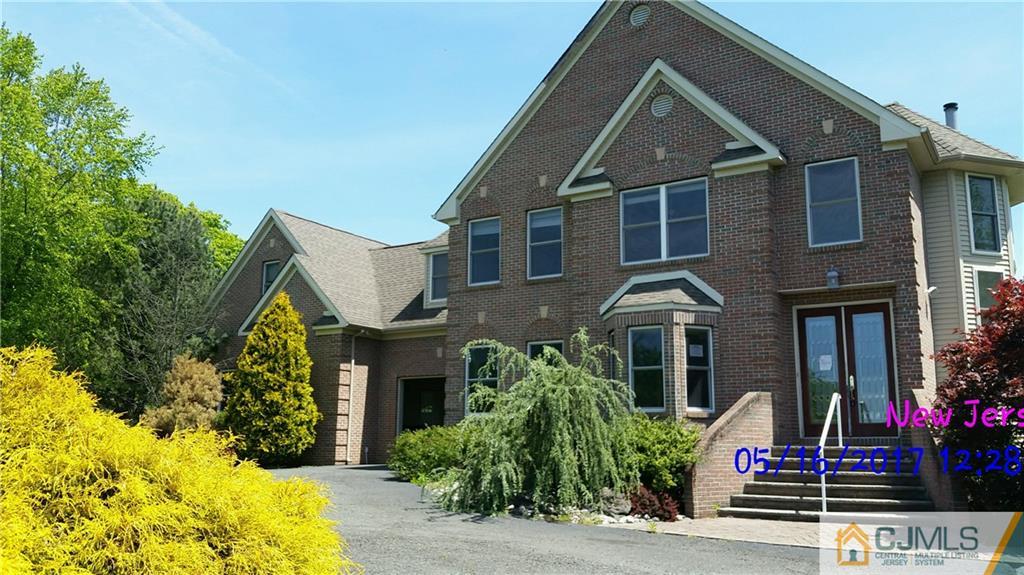 134 North Bergen Mills Road Monroe Township, NJ 08831 - Photo 1 of 11 a front view of a house