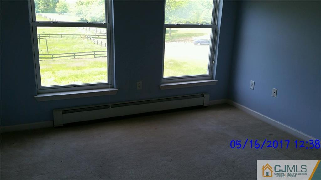 134 North Bergen Mills Road Monroe Township, NJ 08831 - Photo 9 of 11 a view of an empty room with a window