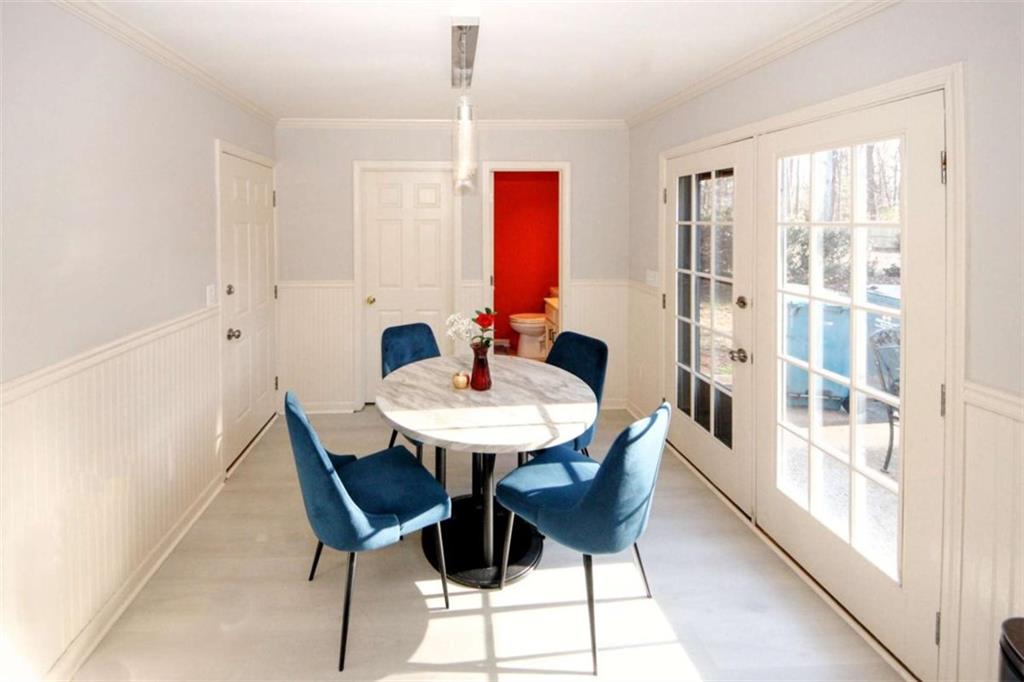 4025 Ivy Run Circle Duluth, GA 30096 - Photo 13 of 34 a view of a dining room with furniture window and outside view