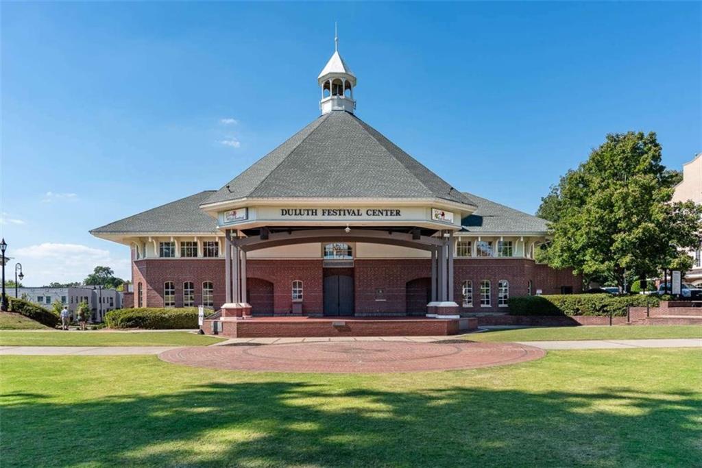 4025 Ivy Run Circle Duluth, GA 30096 - Photo 29 of 34 a front view of a house with swimming pool