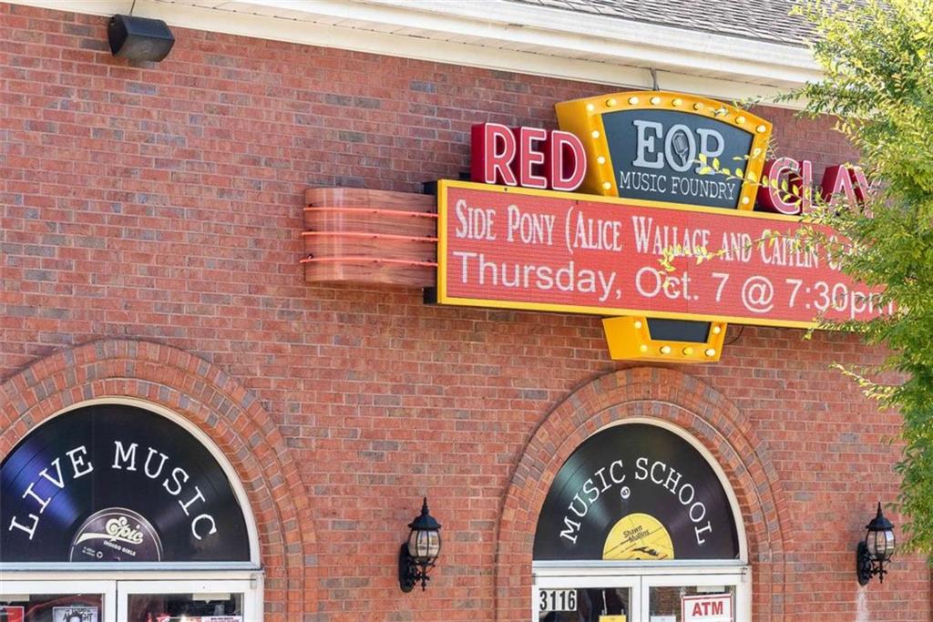 4025 Ivy Run Circle Duluth, GA 30096 - Photo 30 of 34 a sign that is on the wall of a building