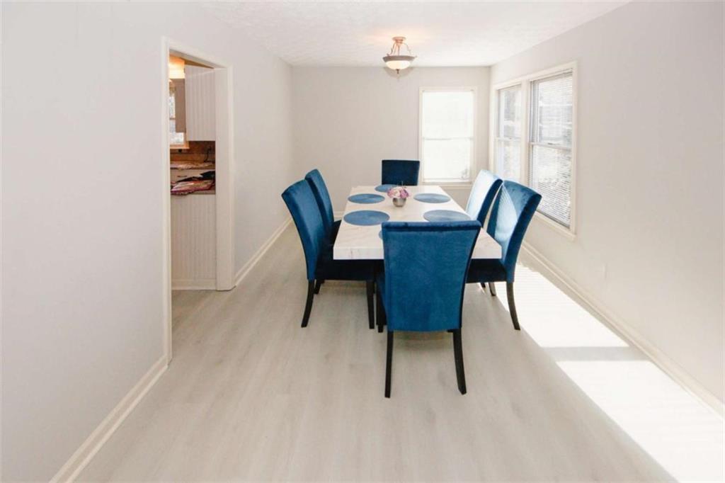 4025 Ivy Run Circle Duluth, GA 30096 - Photo 8 of 34 a view of a dining room with furniture