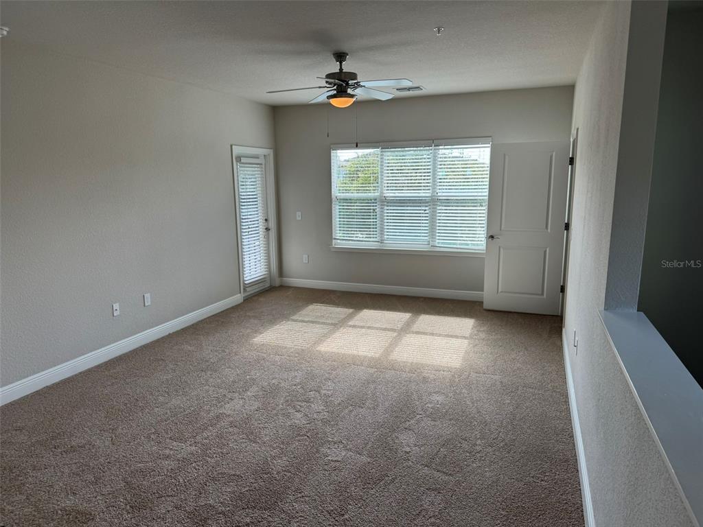 2420 Ann Rou Road, Unit 201 Tavares, FL 32778 - Photo 6 of 25 a view of an empty room with a window
