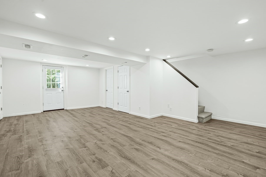 53 Madison Road Wellesley, MA 02481 - Photo 13 of 18 a view of empty room with wooden floor