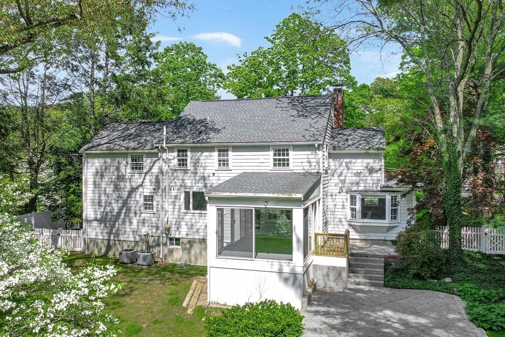 53 Madison Road Wellesley, MA 02481 - Photo 17 of 18 front view of a house with a yard