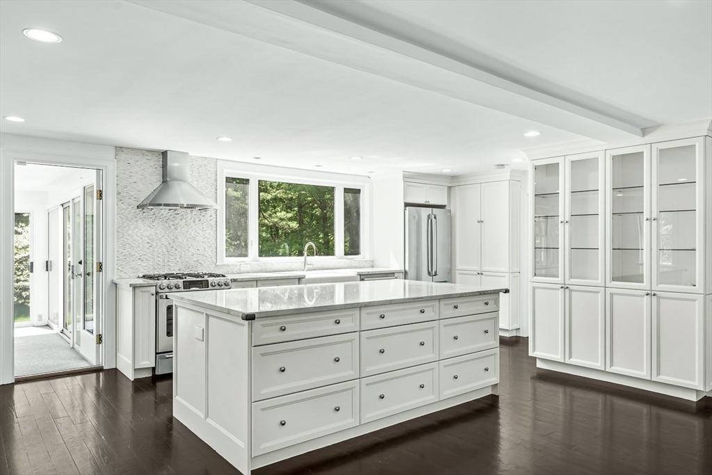 53 Madison Road Wellesley, MA 02481 - Photo 4 of 18 a kitchen with granite countertop a stove and a sink