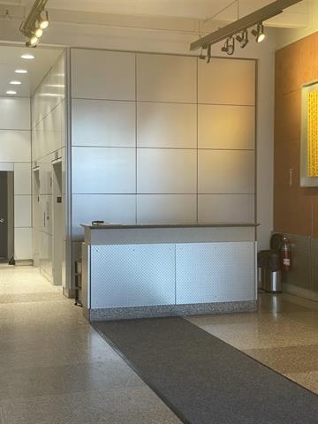 150 Bay Street, Unit 911 Jersey City, NJ 07302 - Photo 2 of 14 a view of a room with shelves