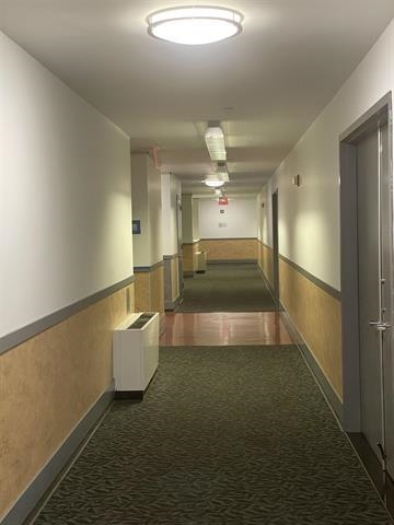 150 Bay Street, Unit 911 Jersey City, NJ 07302 - Photo 3 of 14 a view of a bathroom with a tub and shower