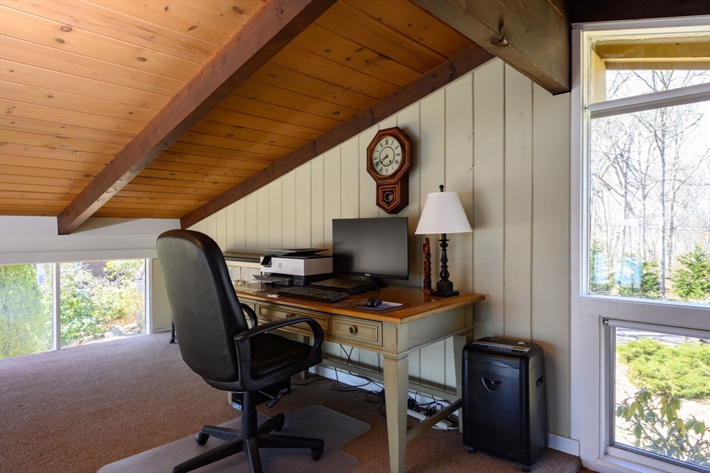 97 Bells Neck Road West Harwich, MA 02671 - Photo 19 of 41 a view of a workspace with furniture and a window