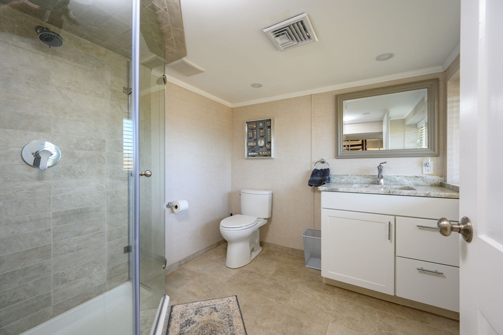 97 Bells Neck Road West Harwich, MA 02671 - Photo 23 of 41 a bathroom with a granite countertop sink toilet and shower