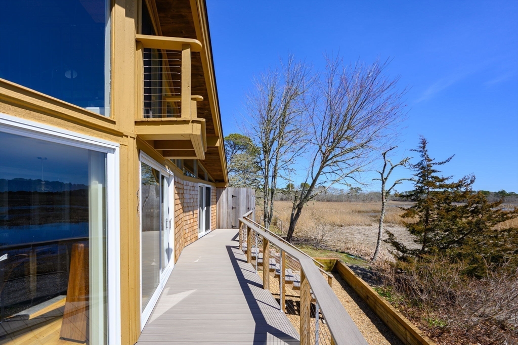 97 Bells Neck Road West Harwich, MA 02671 - Photo 26 of 41 a view of outdoor space and deck