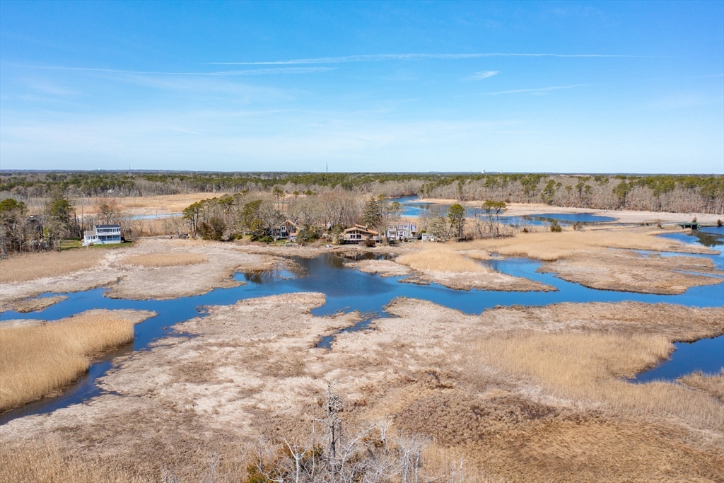 97 Bells Neck Road West Harwich, MA 02671 - Photo 38 of 41 a view of lake with beach
