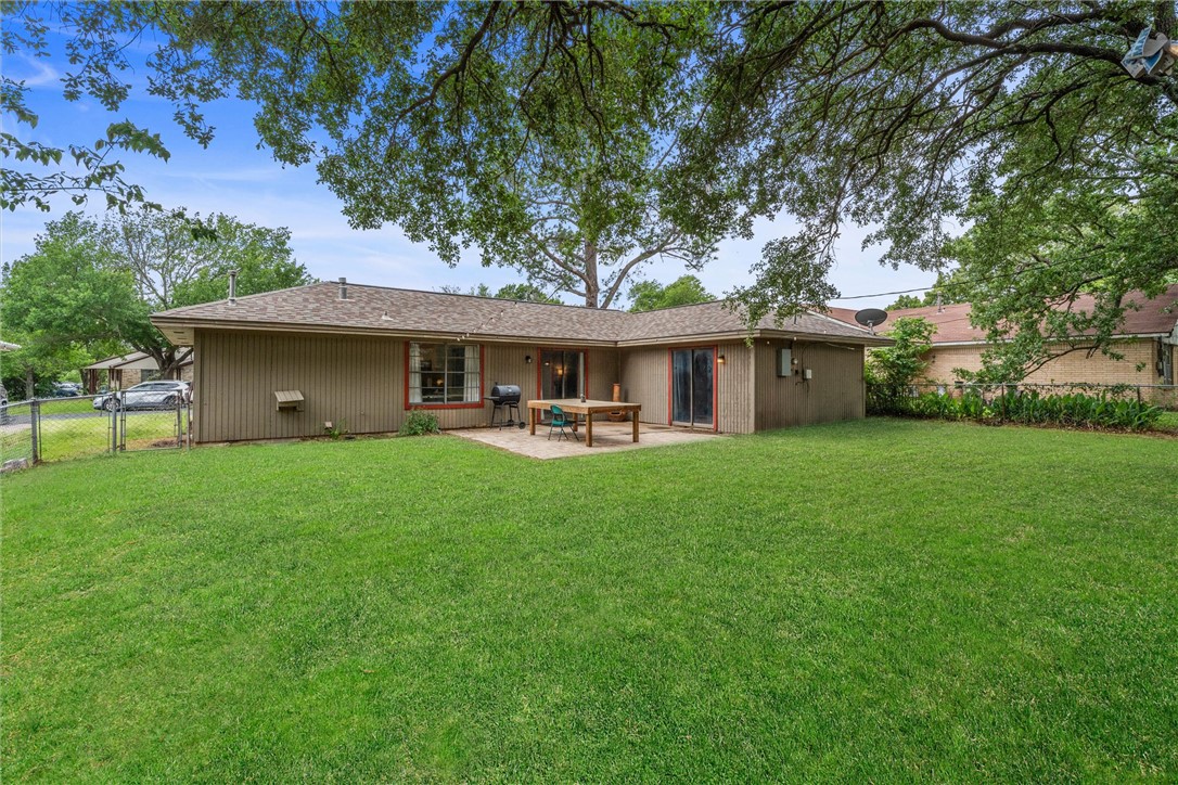 3511 Pecos Court Bryan, TX 77801 - Photo 19 of 22 a front view of a house with a yard and trees