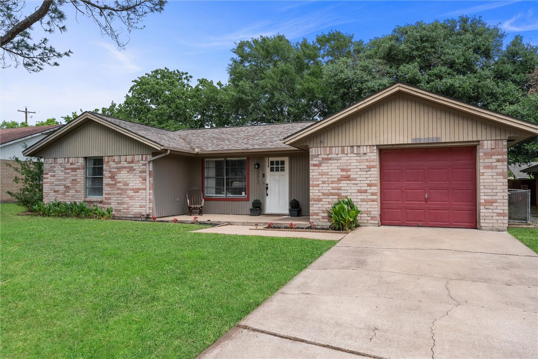 3511 Pecos Court Bryan, TX 77801 - Photo 22 of 22 a front view of a house with yard and green space