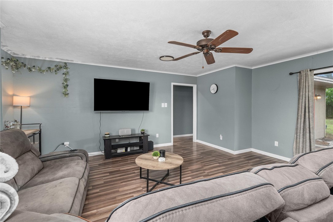 3511 Pecos Court Bryan, TX 77801 - Photo 4 of 22 a living room with furniture and a flat screen tv