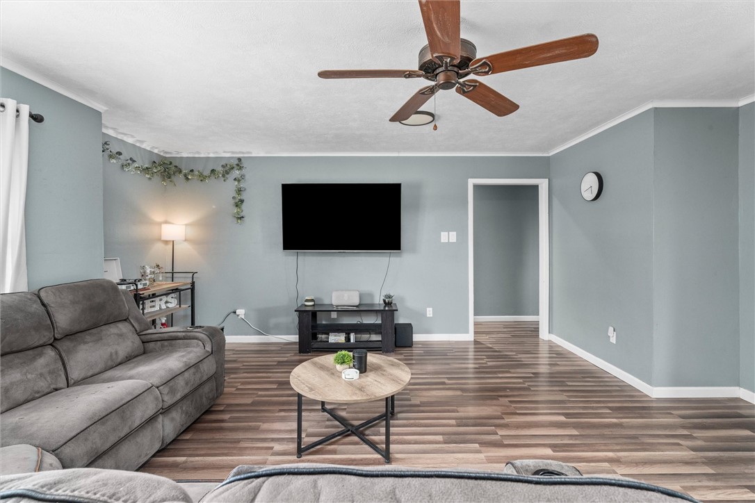 3511 Pecos Court Bryan, TX 77801 - Photo 5 of 22 a living room with furniture and a flat screen tv
