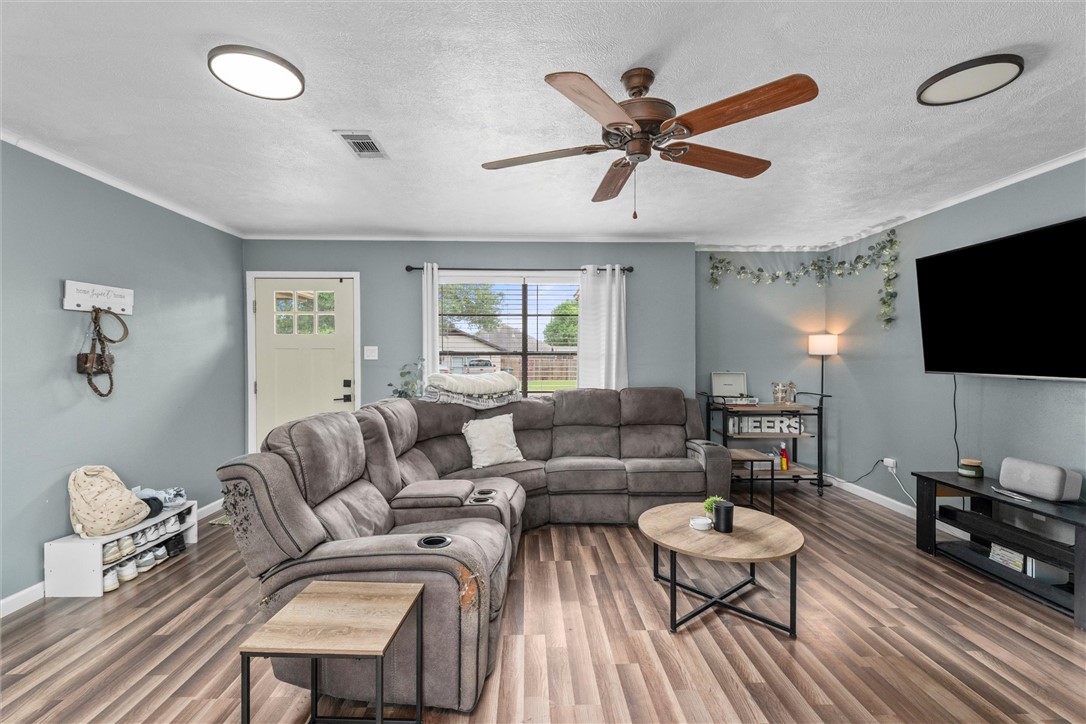 3511 Pecos Court Bryan, TX 77801 - Photo 6 of 22 a living room with furniture and a flat screen tv