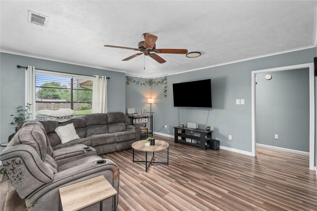 3511 Pecos Court Bryan, TX 77801 - Photo 7 of 22 a living room with furniture and a flat screen tv