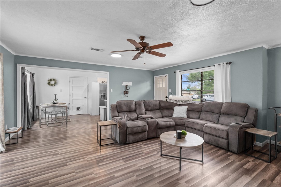3511 Pecos Court Bryan, TX 77801 - Photo 8 of 22 a living room with furniture and a wooden floor
