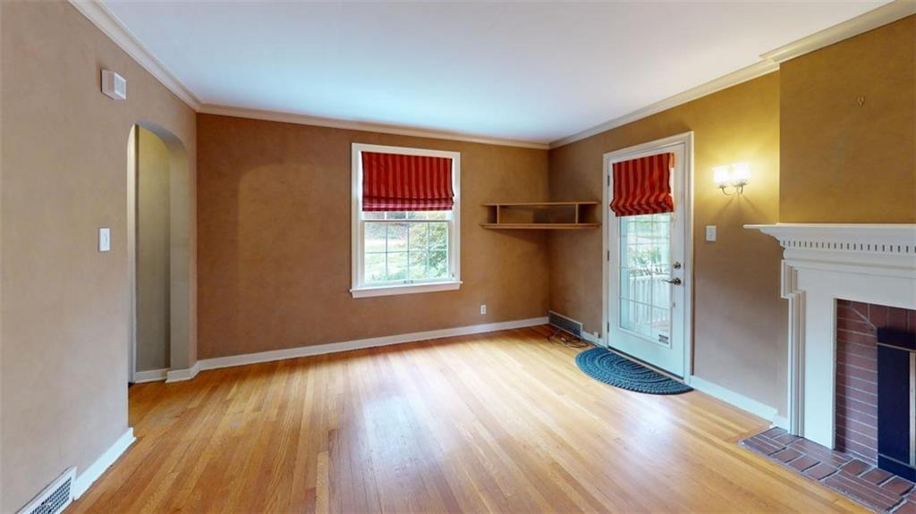 1030 Blackridge Road Pittsburgh, PA 15235 - Photo 7 of 42 Living Room with door to side porch