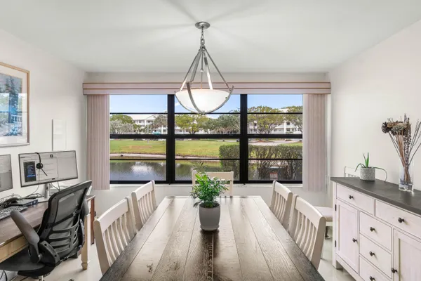 a view of a living room and dining room