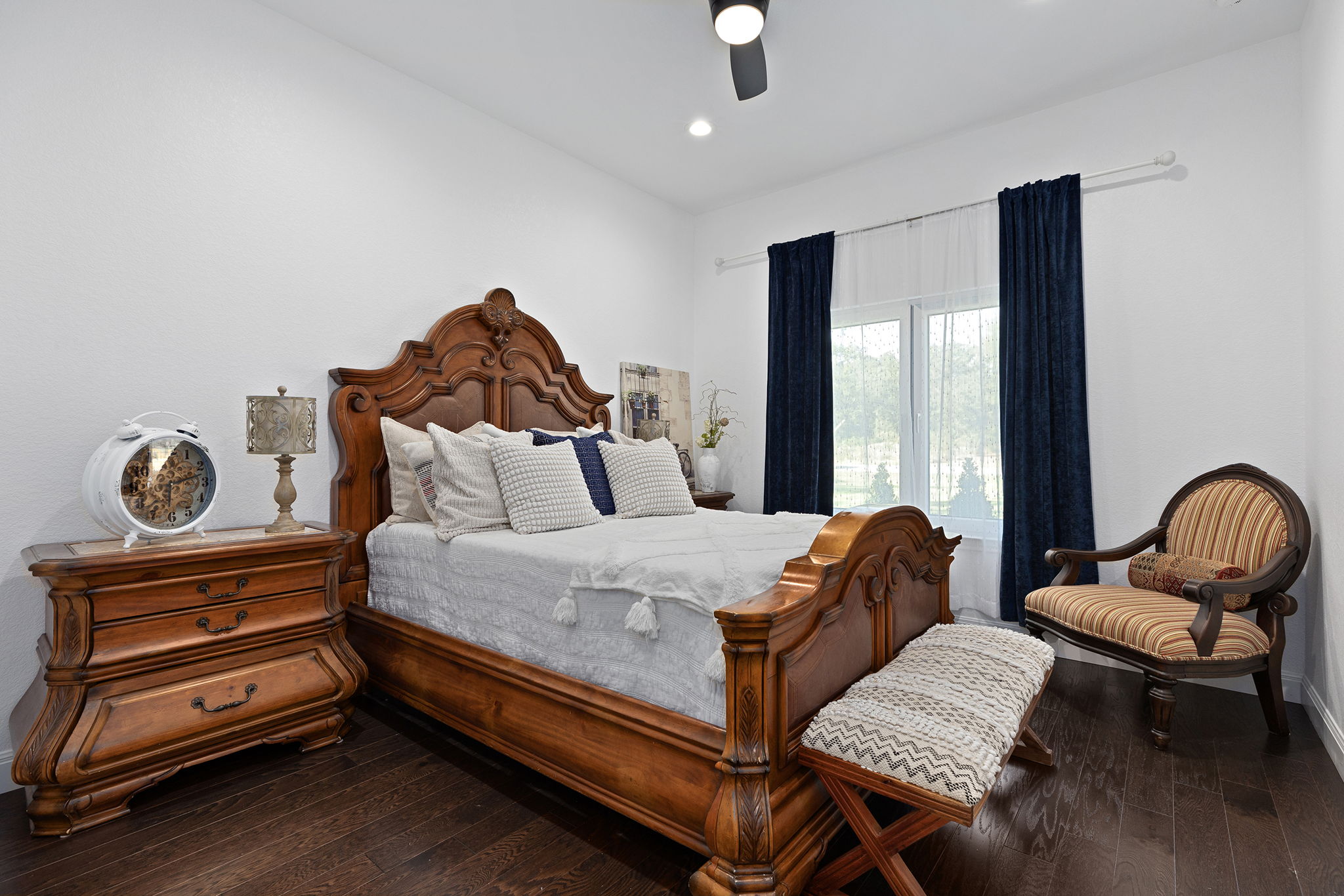 153 Fawn Hollow Elgin, TX 78621 - Photo 26 of 40 a bed room with a bed and a chair