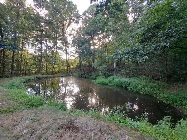 a view of a lake view with green space